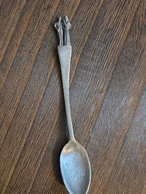 Silver-Tone Decorative Metal Spoon with Sculpted Handle